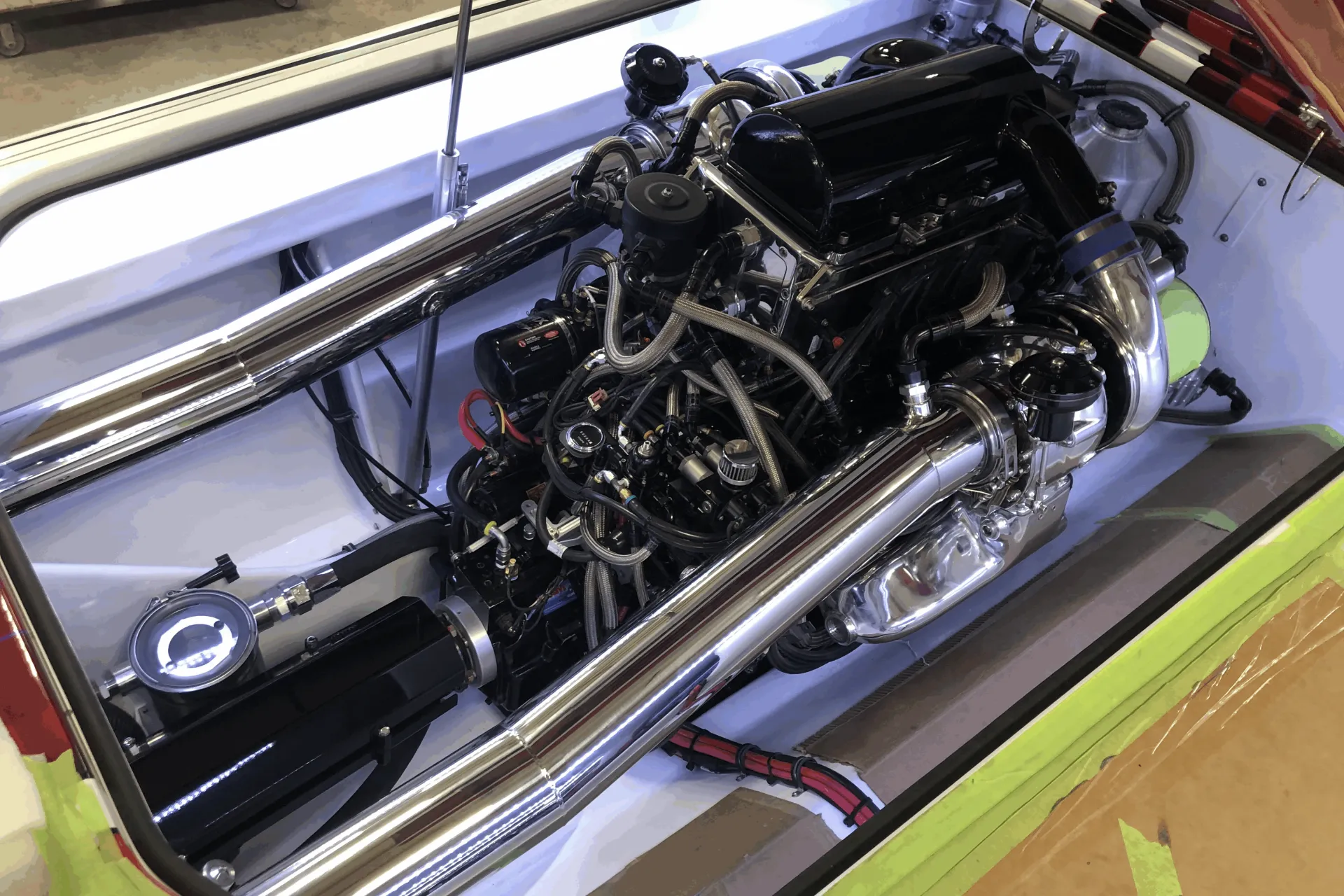 Custom-built marine racing engine installed in a race boat hull