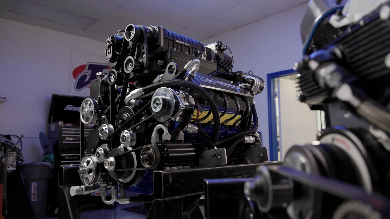Supercharged Sterling marine engine on the stand in the Milford shop, built and ready for dyno testing
